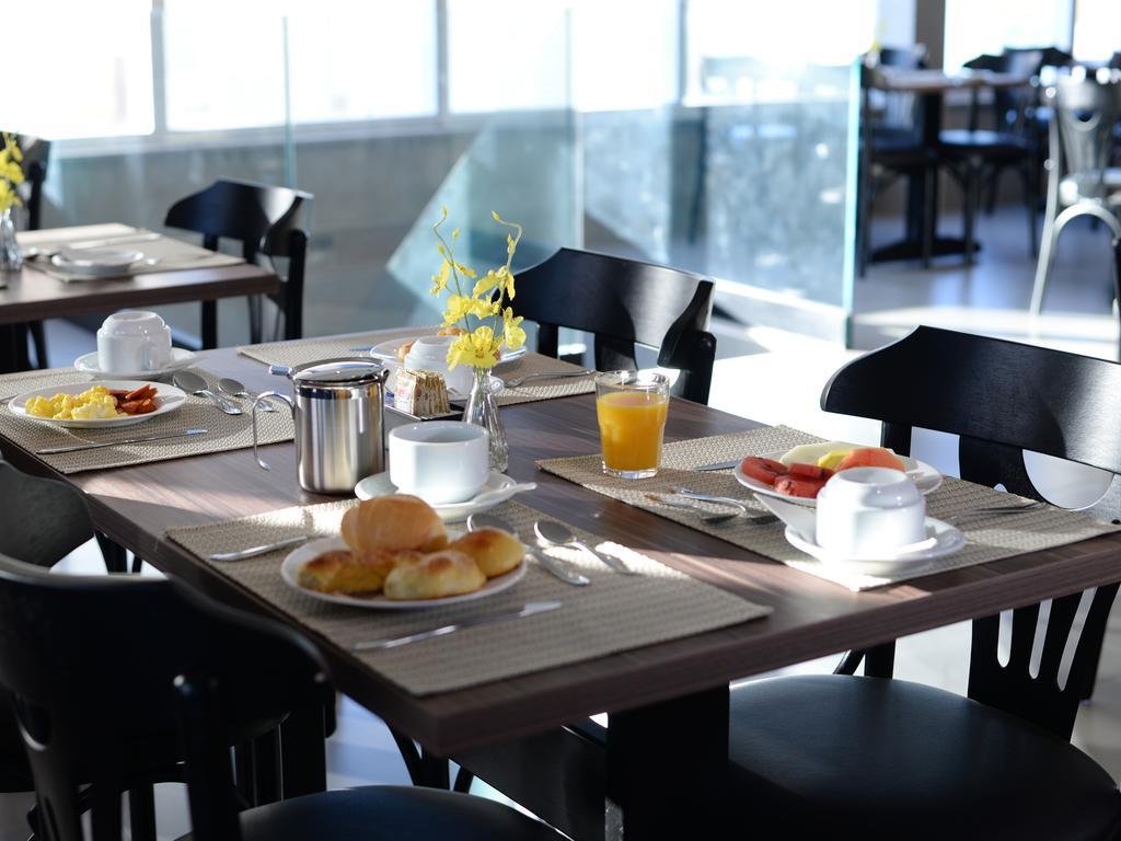 Dubai Suites Montes Claros Buitenkant foto