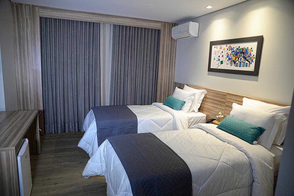 Dubai Suites Montes Claros Buitenkant foto